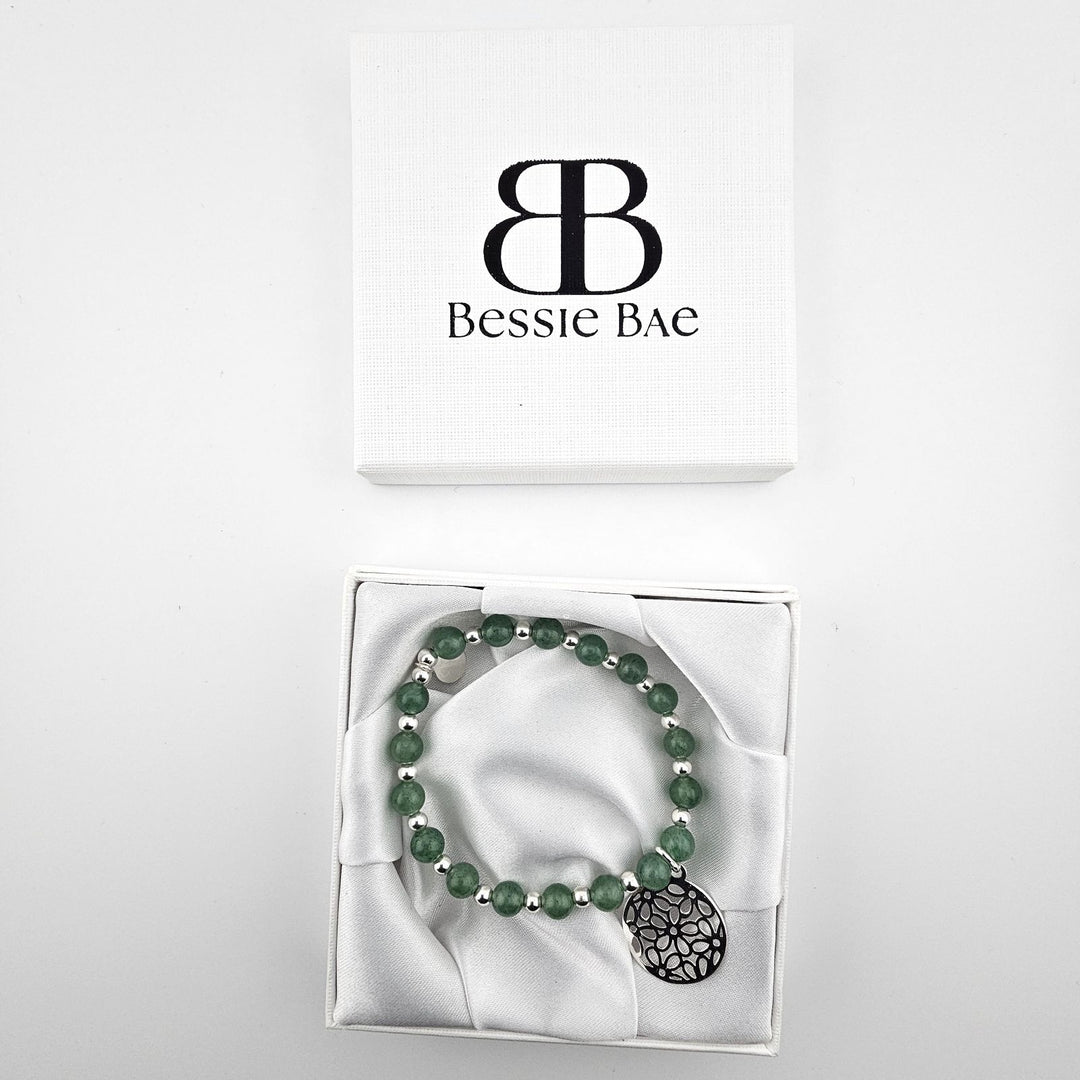Green aventurine and silver charm bracelet in Bessie Bae gift box.