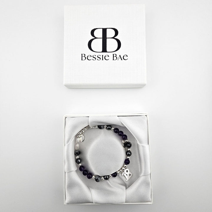 18th birthday Sterling Silver bracelet with Amethyst and Snowflake Obsidian gemstones in Bessie Bae gift box.