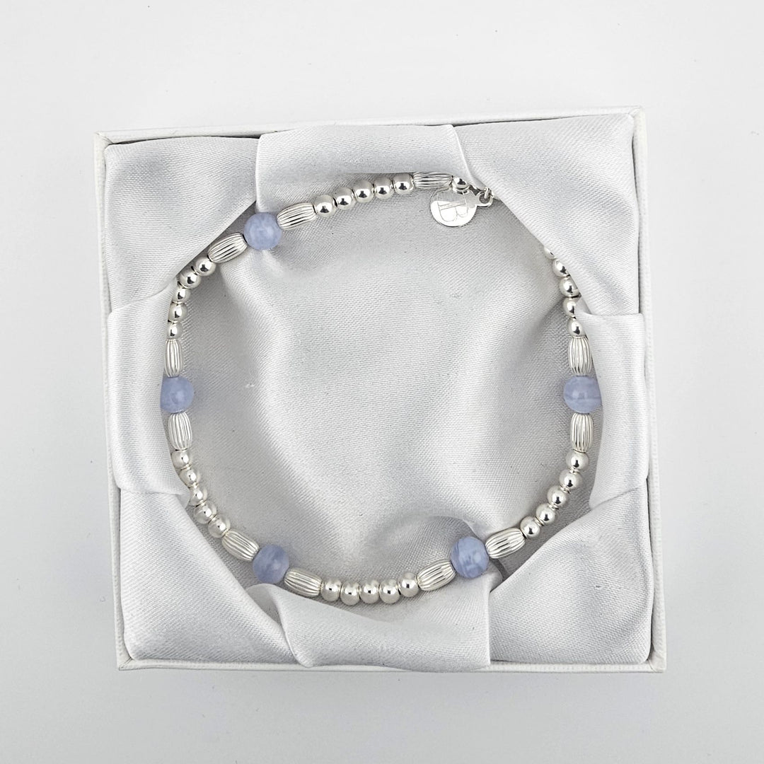 Blue lace agate anklet displayed in Bessie Bae gift box.