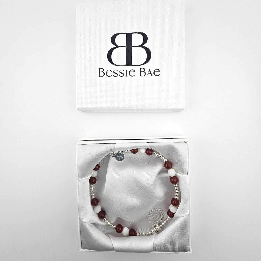 Garnet and Mother of Pearl anklet presented in open gift box.