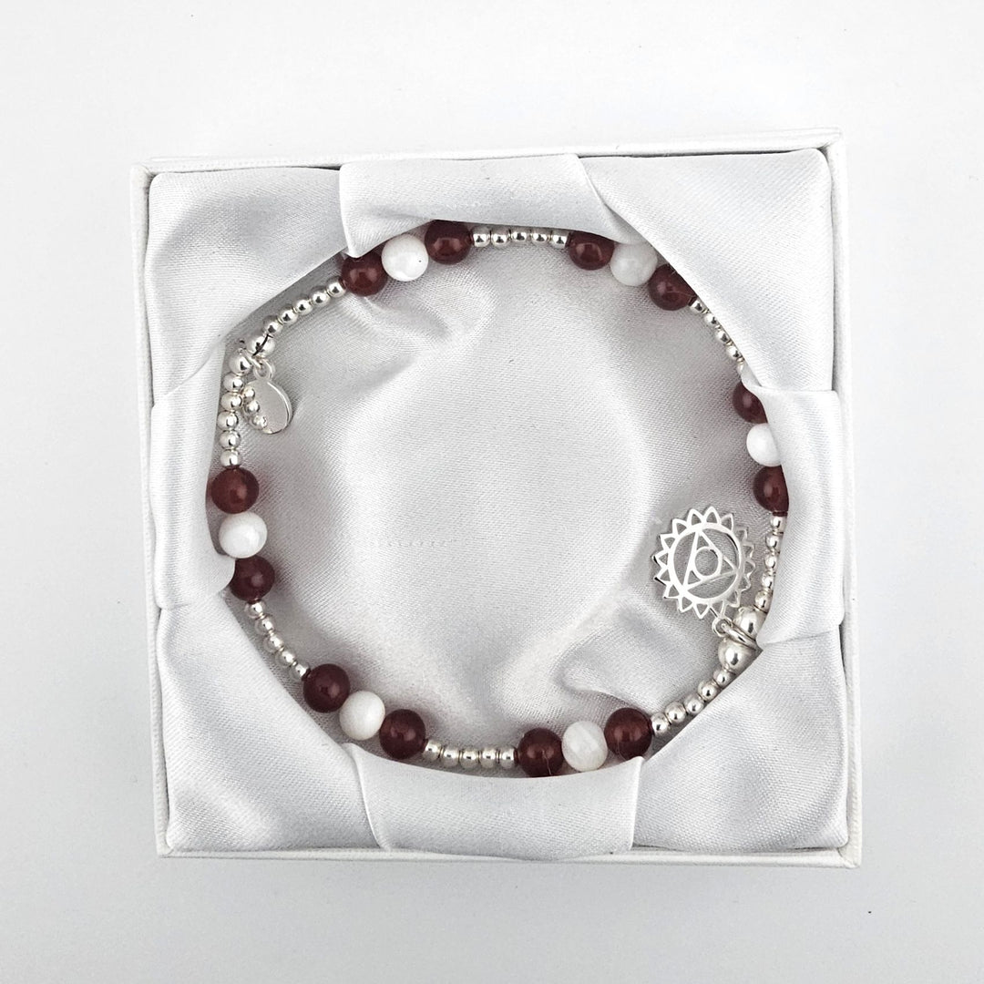 Garnet and Mother of Pearl anklet displayed in Bessie Bae gift box.