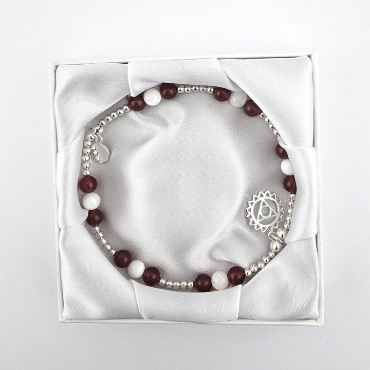 Garnet and Mother of Pearl anklet displayed in Bessie Bae gift box.