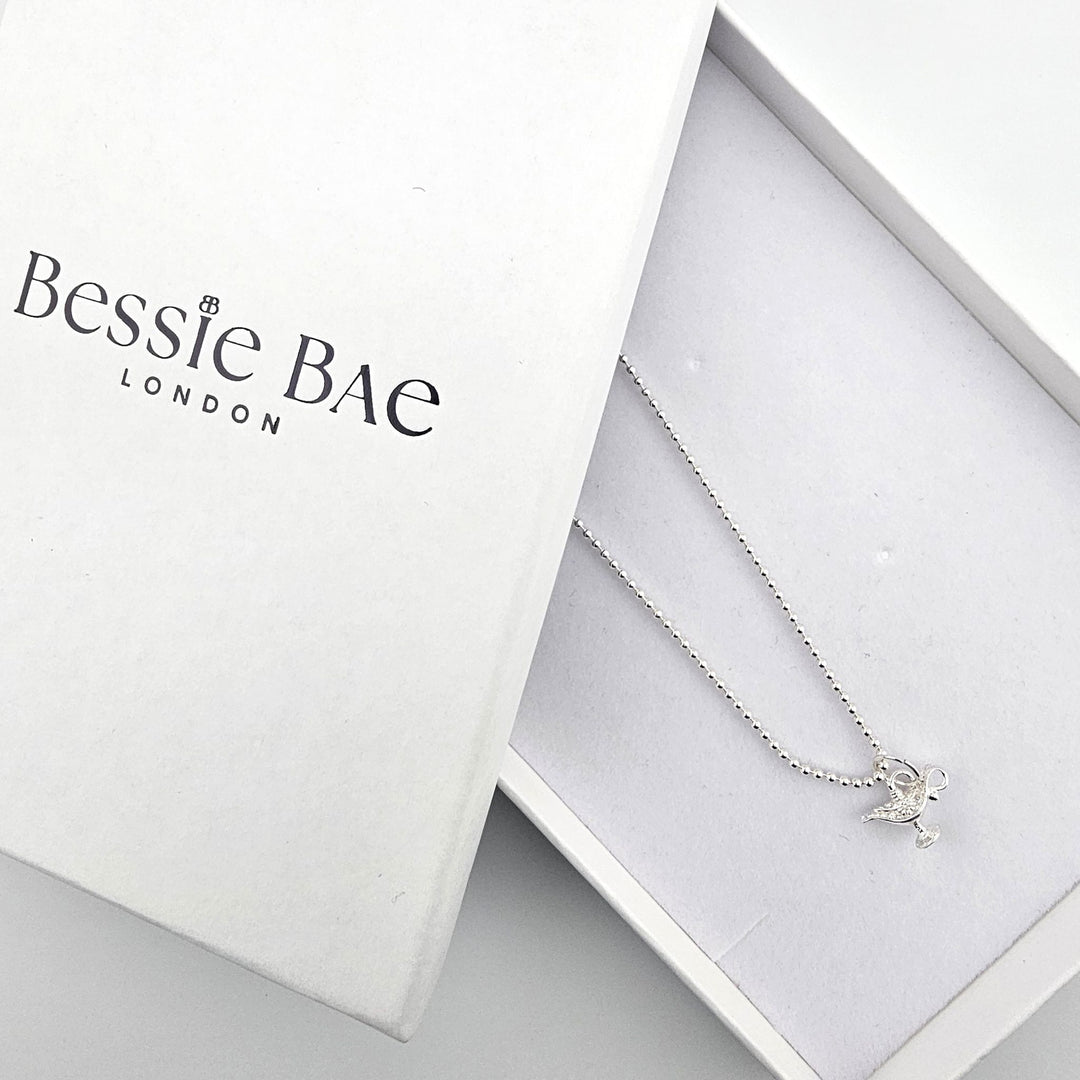 Sterling silver genie’s lamp necklace presented in Bessie Bae gift box.