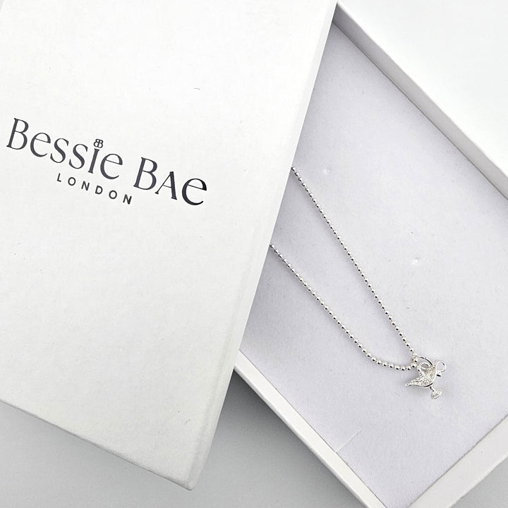 Sterling silver genie’s lamp necklace presented in Bessie Bae gift box.