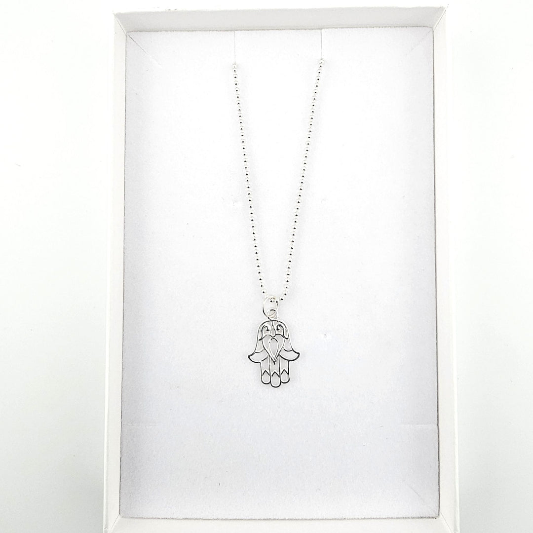 Sterling silver Hamsa necklace presented in a Bessie Bae gift box.