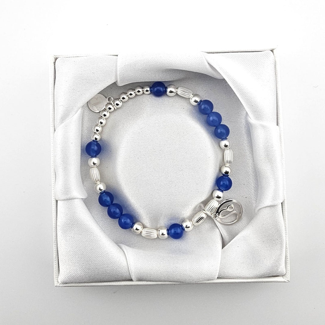 Leo zodiac bracelet and packaging by Bessie Bae.