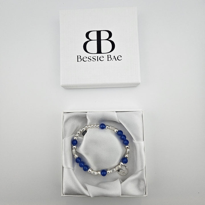 Leo zodiac bracelet in white Bessie Bae gift box.
