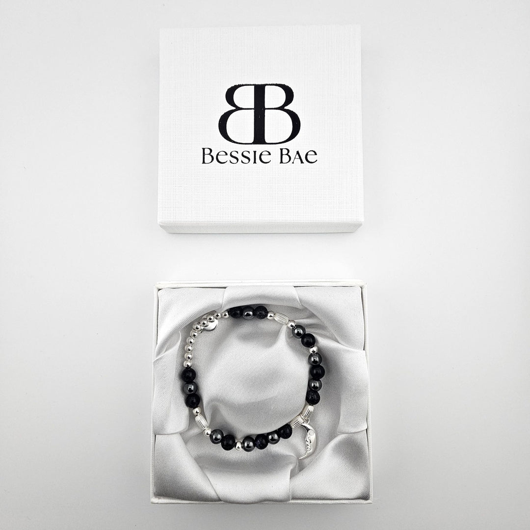 Celestial Sterling Silver bracelet with Blue Goldstone gemstones in Bessie Bae gift box.
