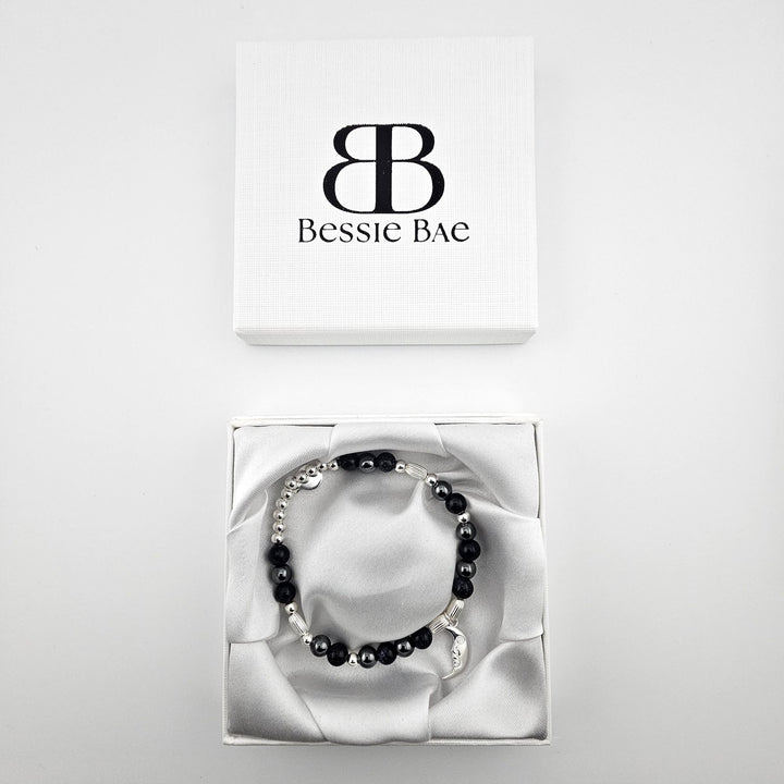 Celestial Sterling Silver bracelet with Blue Goldstone gemstones in Bessie Bae gift box.