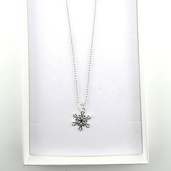 Sterling silver Nordic star necklace presented in a Bessie Bae gift box.