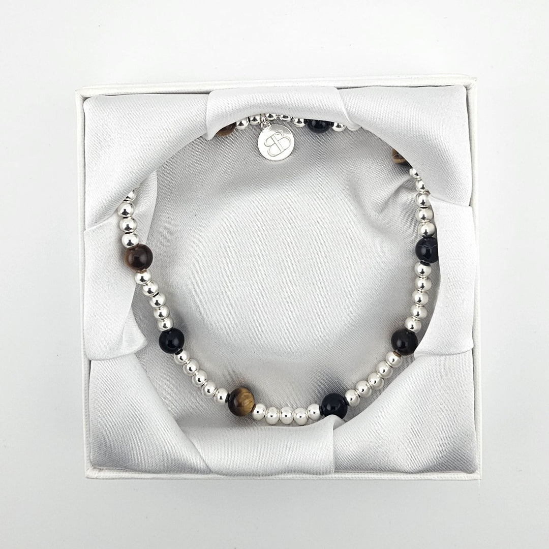 Bessie Bae Sterling Silver Onyx and Tiger’s Eye Anklet displayed in a white jewellery gift box.