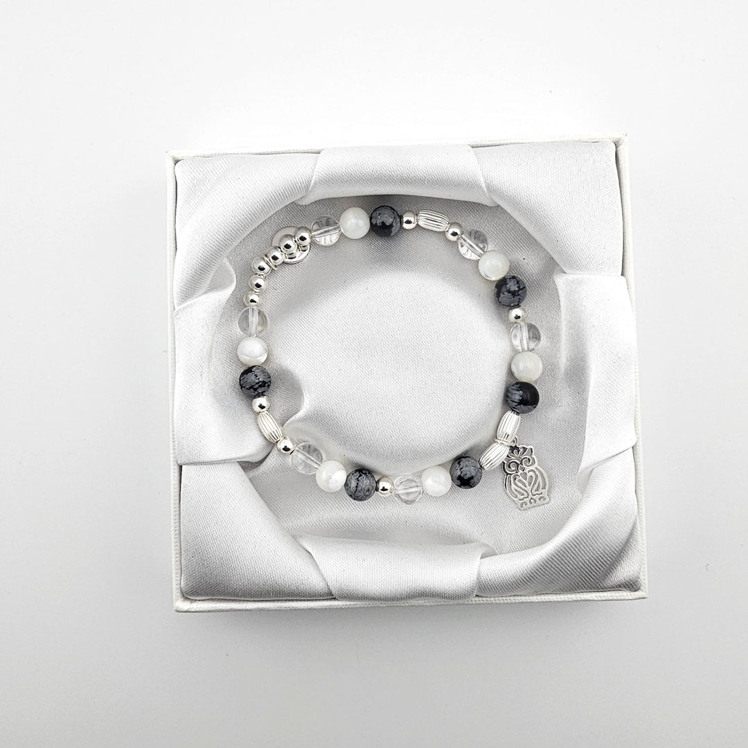 Bessie Bae owl bracelet with packaging.