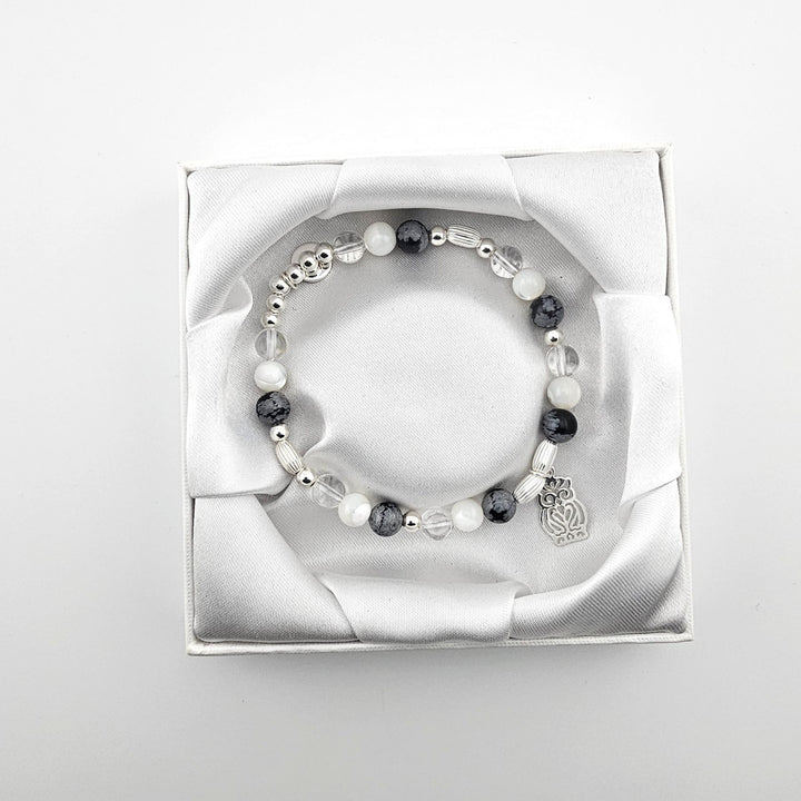 Bessie Bae owl bracelet with packaging.