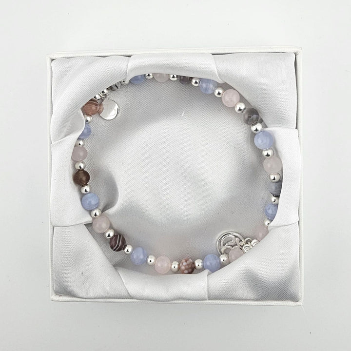 Sterling silver pastel gemstone anklet displayed in luxury Bessie Bae gift box.