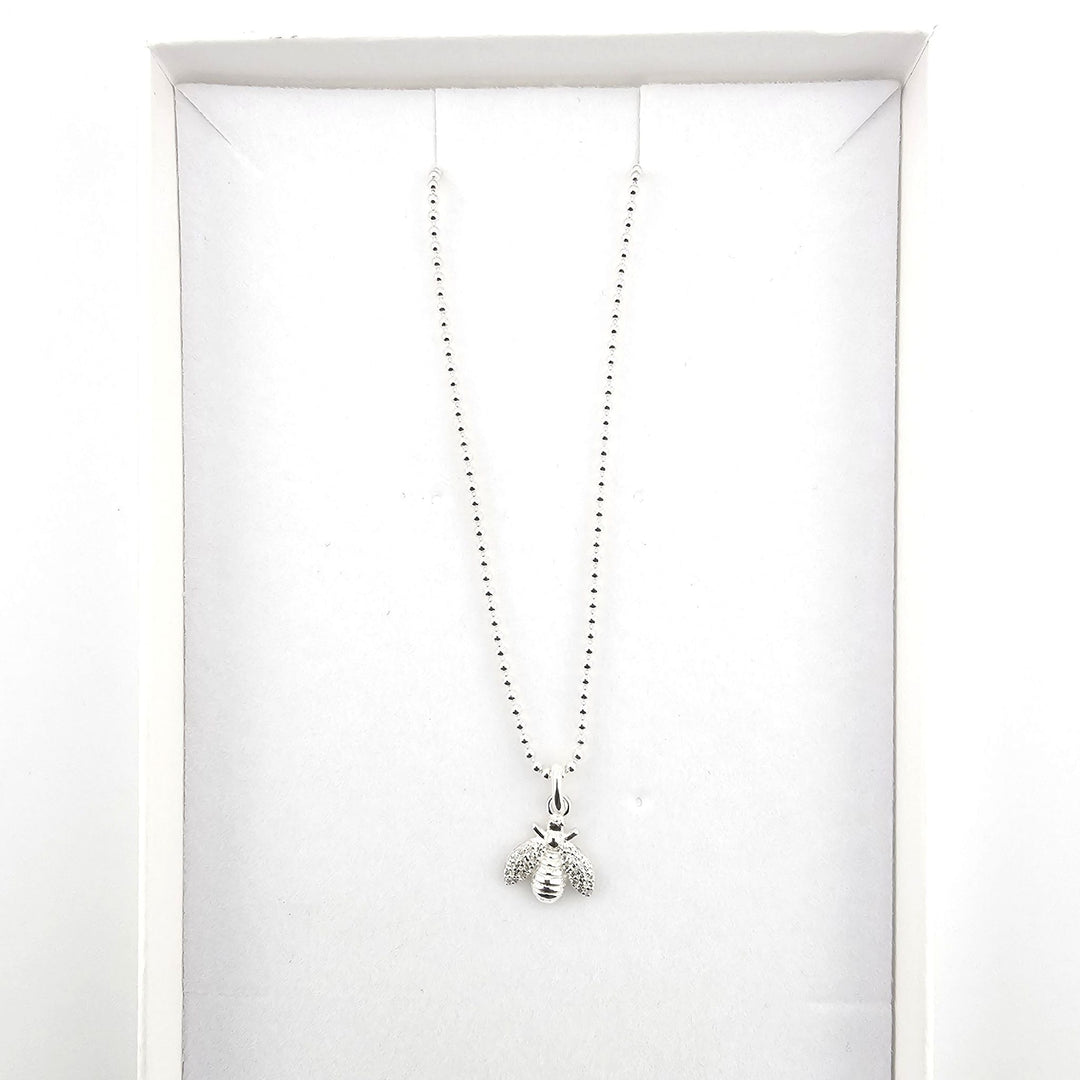 Sterling silver bee necklace presented in Bessie Bae gift box.
