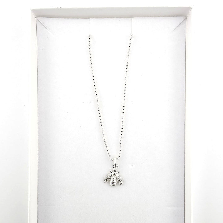 Sterling silver bee necklace presented in Bessie Bae gift box.
