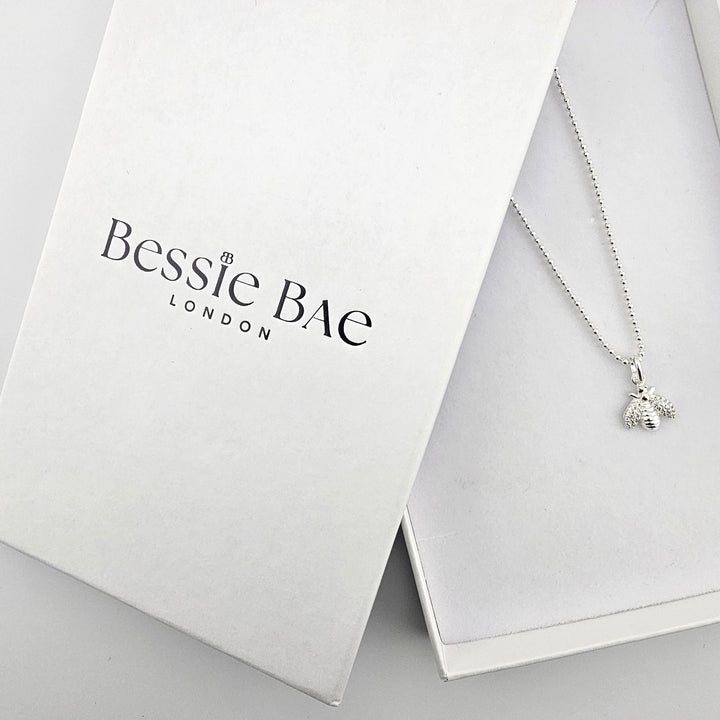 Sterling silver bee necklace presented in Bessie Bae gift box.