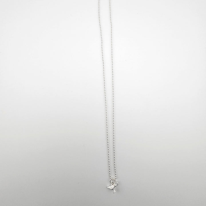 Sterling silver genie’s lamp pendant necklace on ball chain by Bessie Bae.