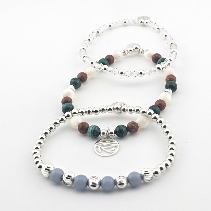 Bessie Bae handmade sterling silver beaded bracelets with green, brown, white and clear semi-precious gemstones.
