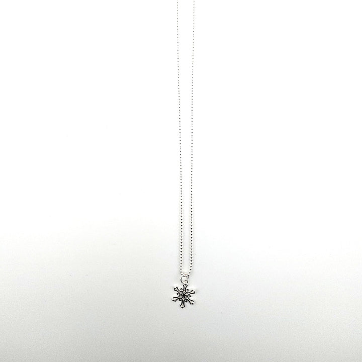terling silver Nordic star necklace by Bessie Bae on a silver ball chain.