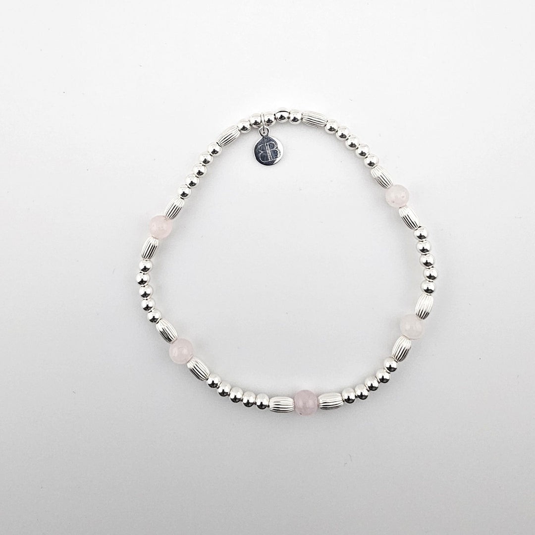 Sterling silver anklet with rose quartz beads by Bessie Bae.