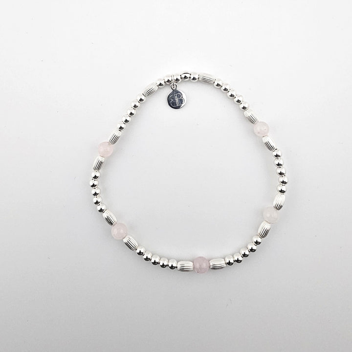 Sterling silver anklet with rose quartz beads by Bessie Bae.