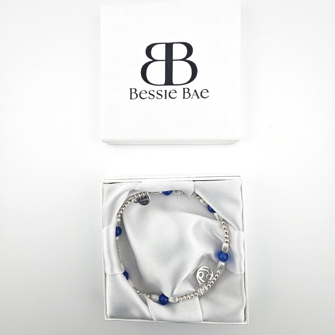 Handmade Cancer zodiac anklet in sterling silver with Blue Agate stones in gift packaging.