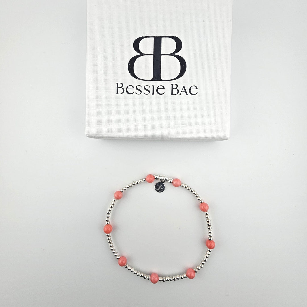 Coral semi-precious anklet with sterling silver beads flatlay by Bessie Bae.