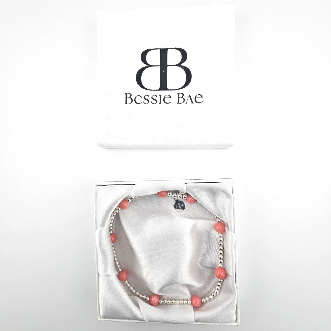 Coral semi-precious sterling silver anklet displayed in Bessie Bae gift box.