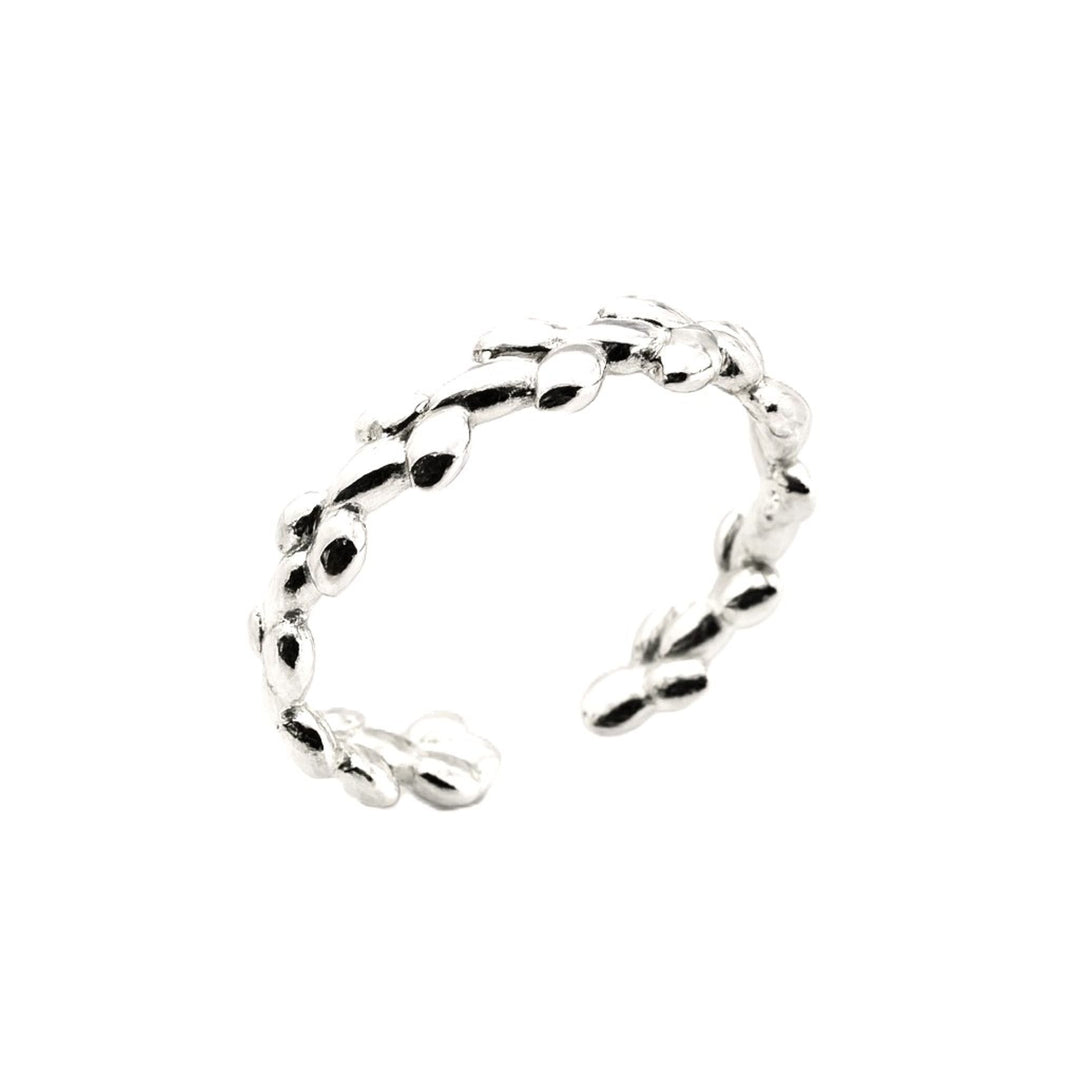 Delicate silver branch ring with leaf details.