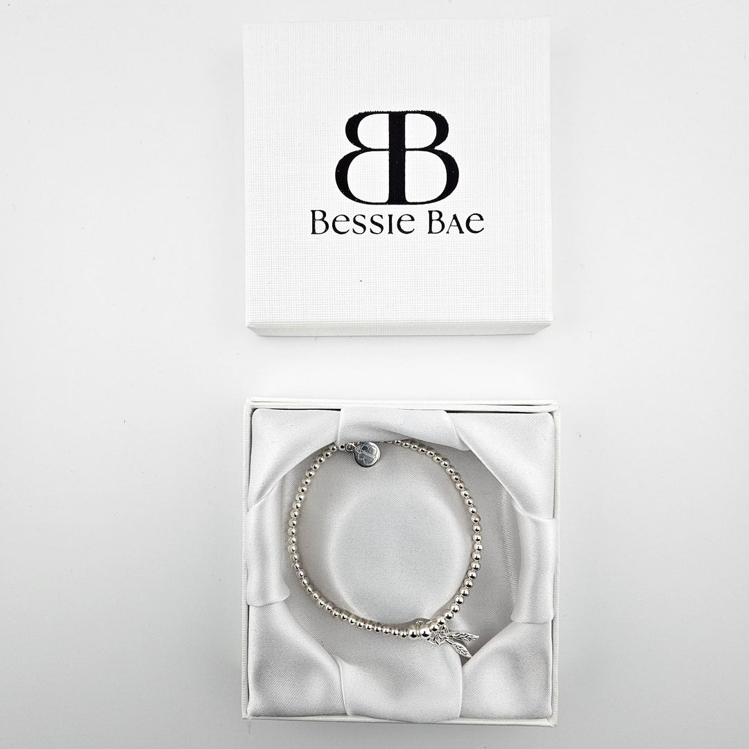 Silver Dreamcatcher Bracelet presented in white Bessie Bae gift box.