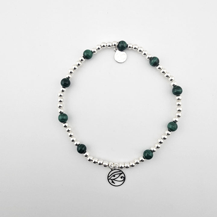Malachite and sterling silver anklet by Bessie Bae with stretch cord and signature charm.