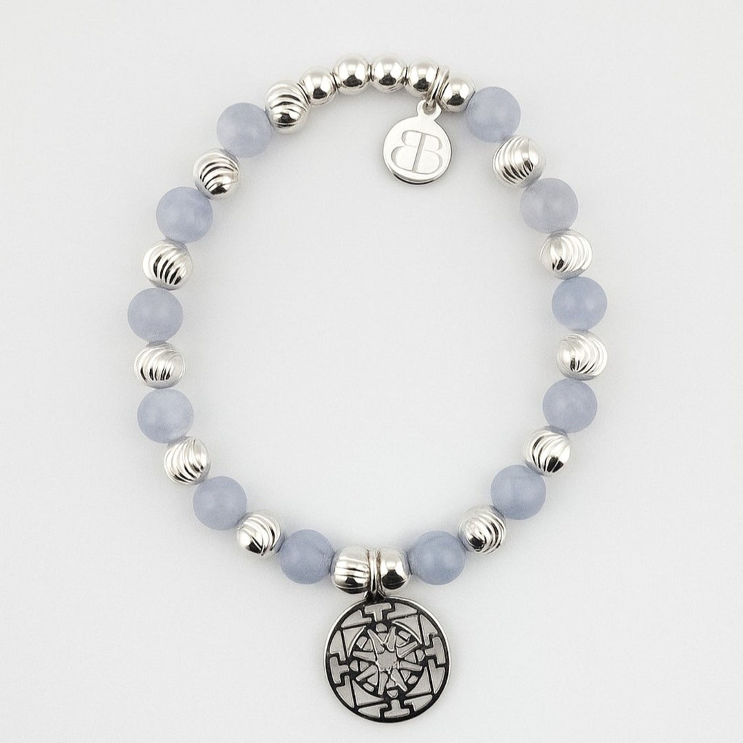 Blue lace agate Mandala silver bracelet on white background.
