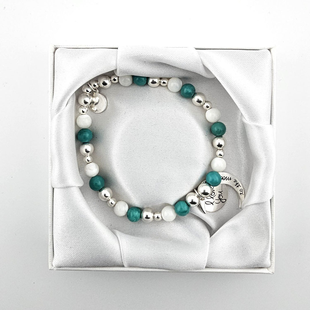 Sterling Silver bracelet displayed in white satin box.