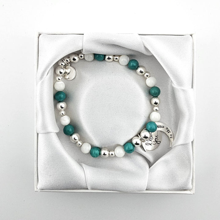 Sterling Silver bracelet displayed in white satin box.