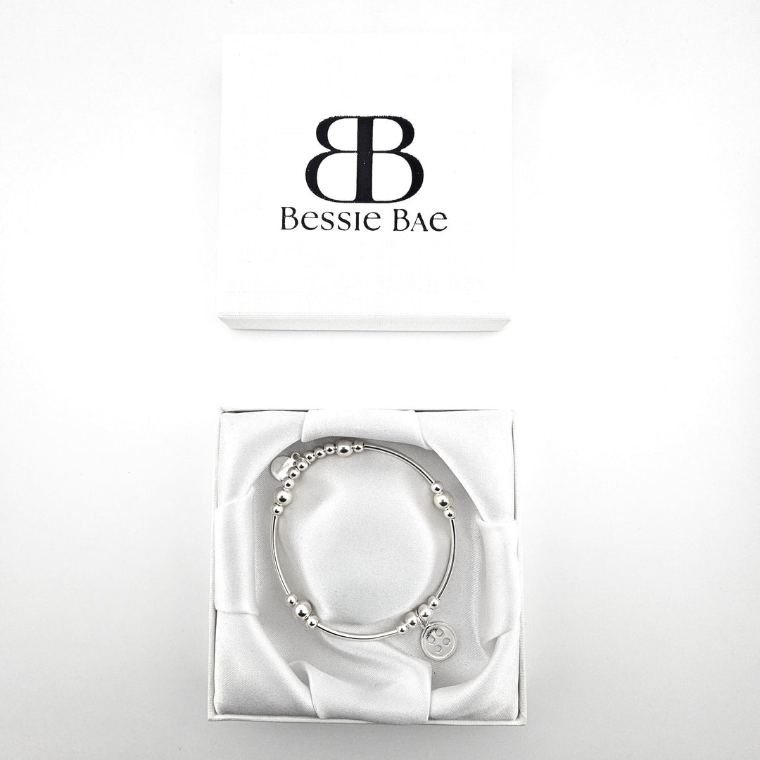 Minimalist Sterling Silver Button Bracelet in Bessie Bae gift box.