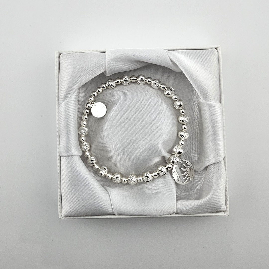 Celestial Sun and Moon Bracelet in Sterling Silver presented in gift box.