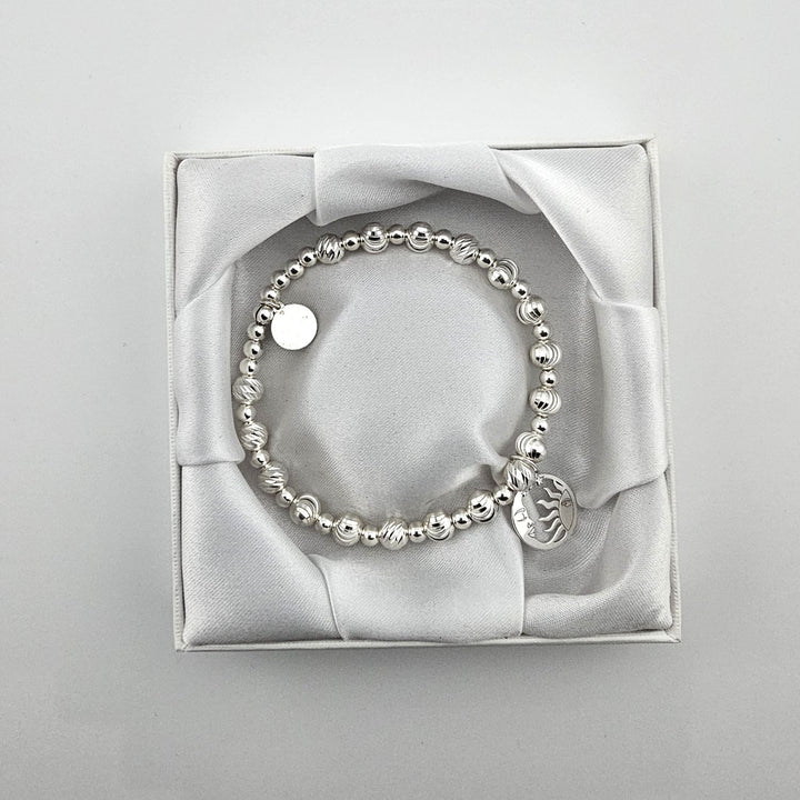 Celestial Sun and Moon Bracelet in Sterling Silver presented in gift box.