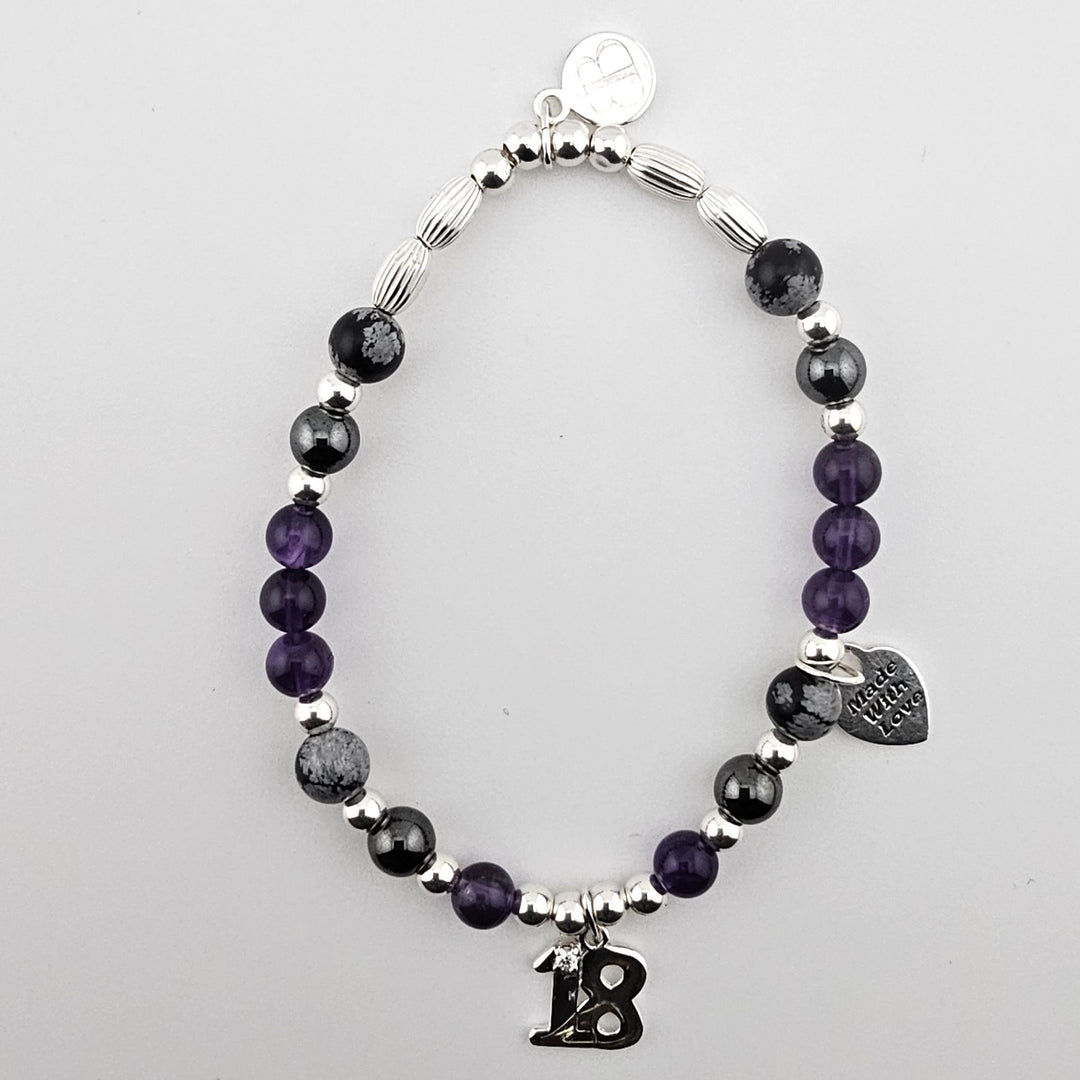 Sterling Silver 18 Bracelet with Amethyst and Snowflake Obsidian beads by Bessie Bae on white background.
