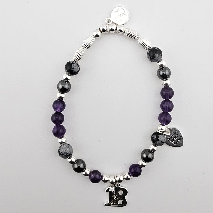 Sterling Silver 18 Bracelet with Amethyst and Snowflake Obsidian beads by Bessie Bae on white background.