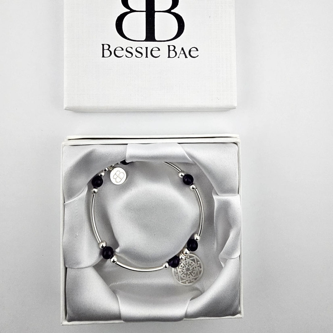 Handmade amethyst and silver beaded bracelet.