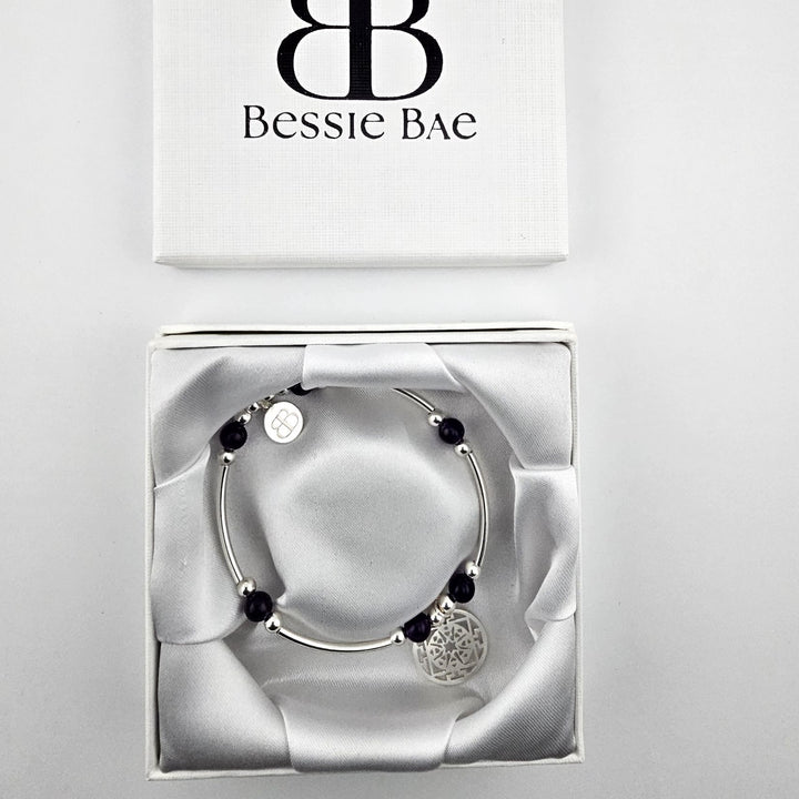 Handmade amethyst and silver beaded bracelet.