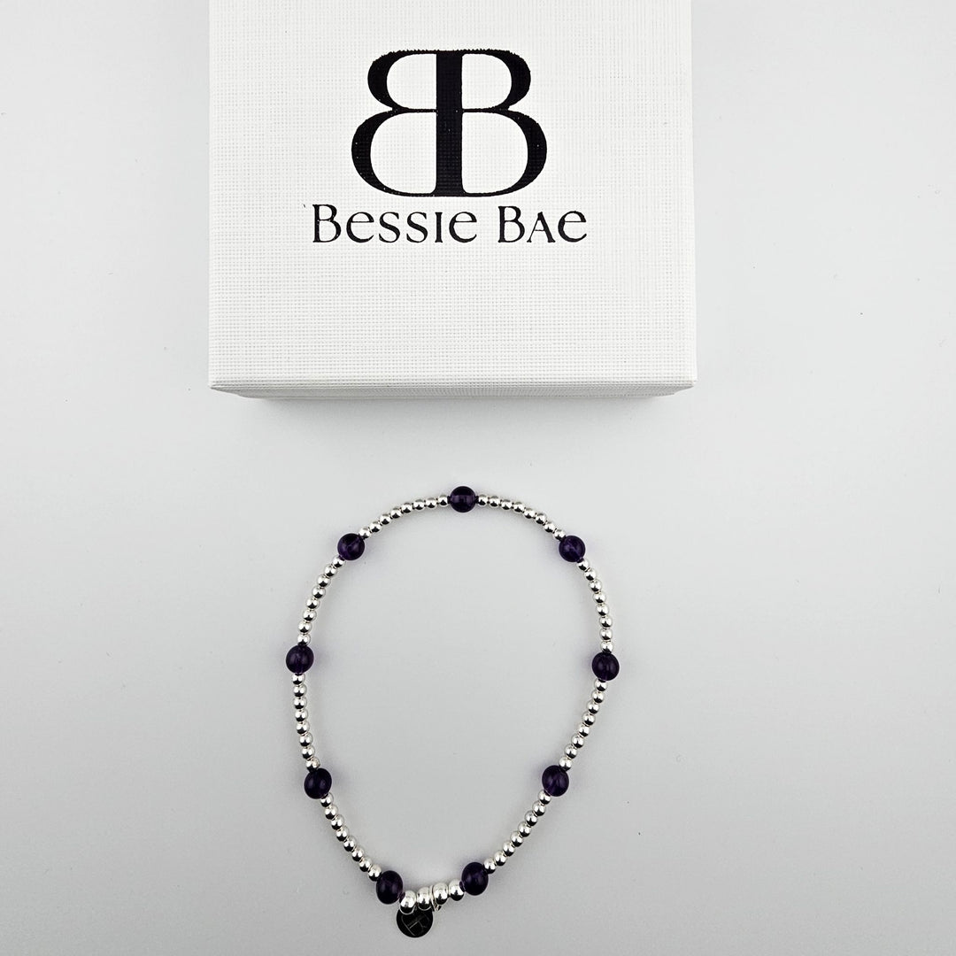 Beaded anklet with 925 sterling silver and amethyst gemstones.