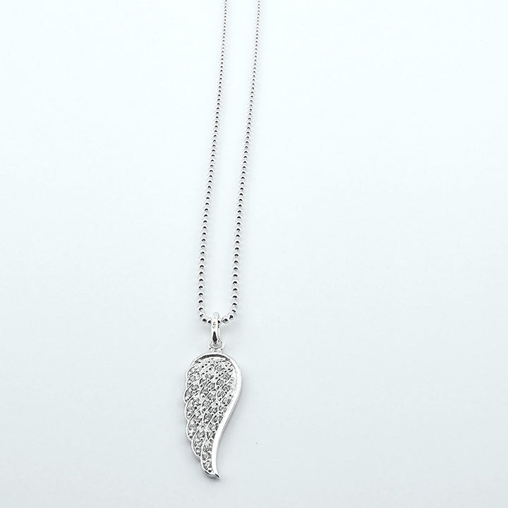 Elegant silver guardian angel wing pendant on fine chain.