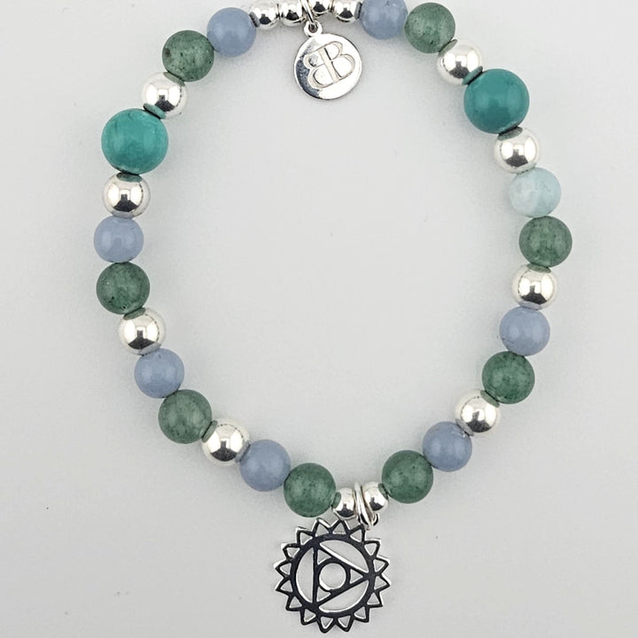 Sterling silver bracelet with angelite and aventurine beads and chakra charm.