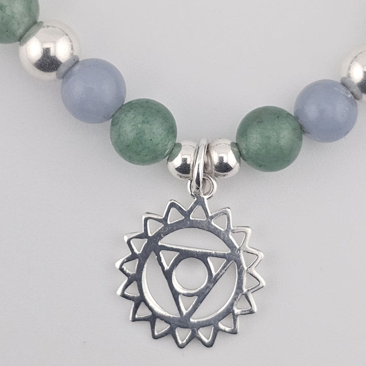 Blue and green gemstone bracelet featuring Third Eye chakra pendant.