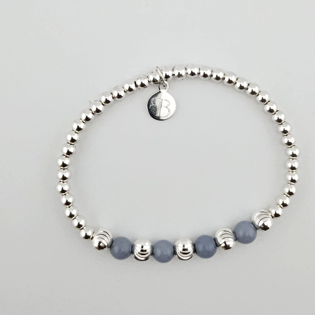 Sterling silver bracelet with angelite gemstone beads.