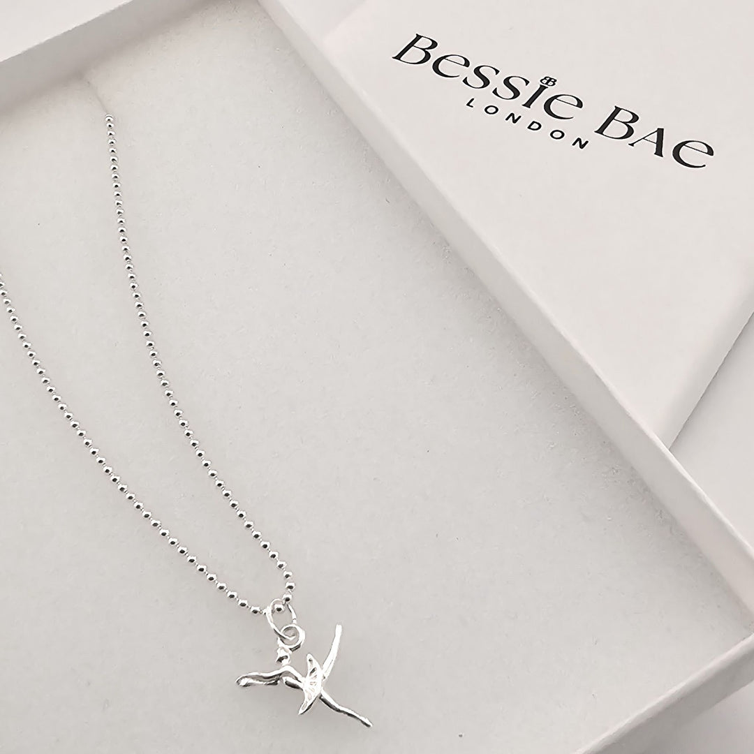 Sterling silver ballerina necklace, elegant gift for dancers and performers.