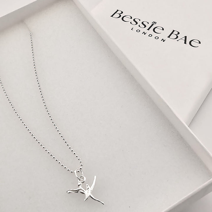 Sterling silver ballerina necklace, elegant gift for dancers and performers.