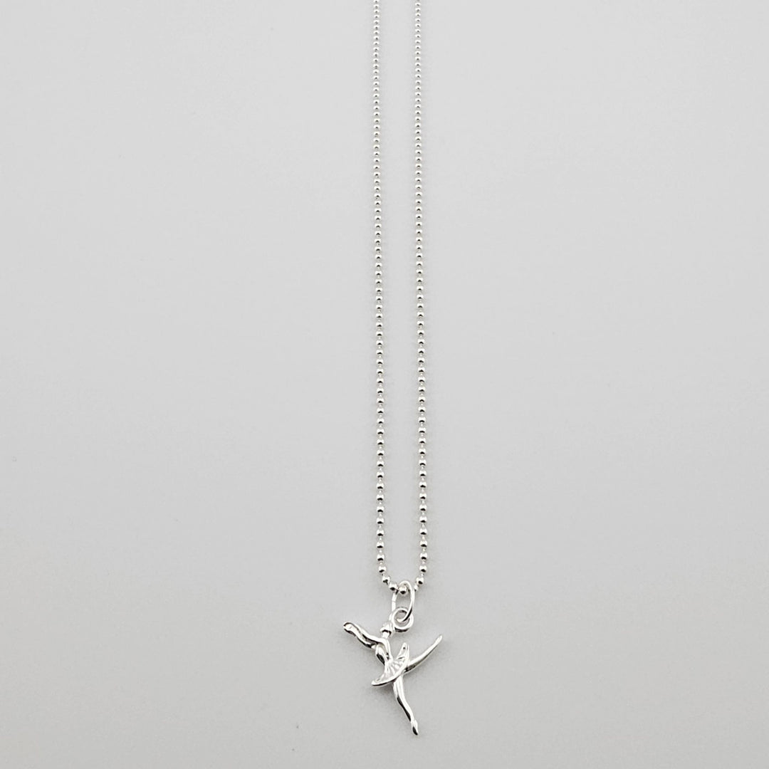 Sterling silver ballerina pendant necklace on fine chain.